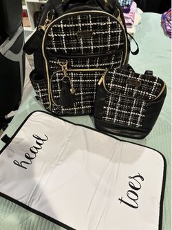 From bye-bye BABY, high fashion, black and white with tan and black bows inside diaper bag with bottle cooler and changing pad never used From bye-bye