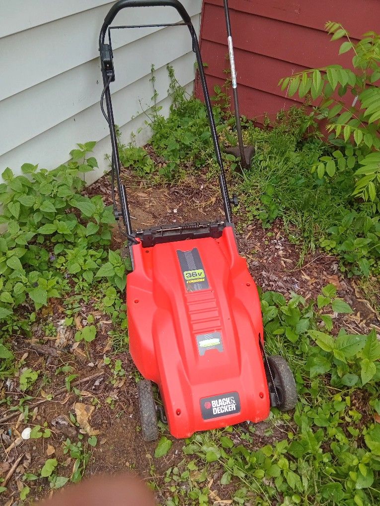 LAWN MOWER AND A WEED WACKER
