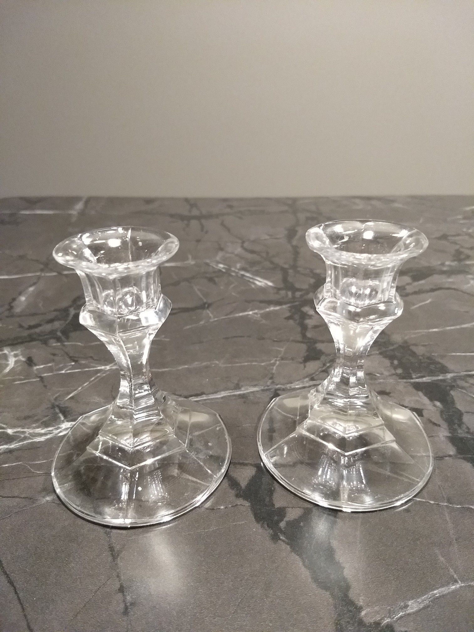 Pair of vintage glass candlestick holders.