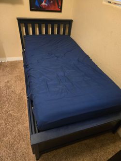 Twin bed frame with trundle & 2 mattresses