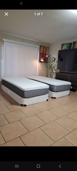 2 VERY NICE XL TWIN MATTRESSES AND BOXSPRINGS FOR SALE! IN GREAT CONDITION, FREE DELIVERY