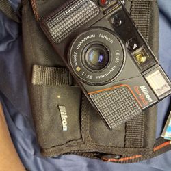 Vintage Nikon One Touch 