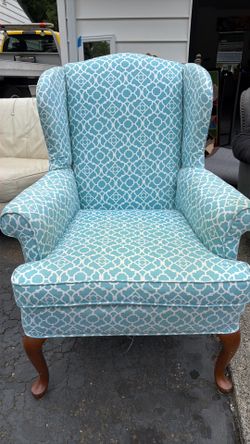 Blue tufted arm chair