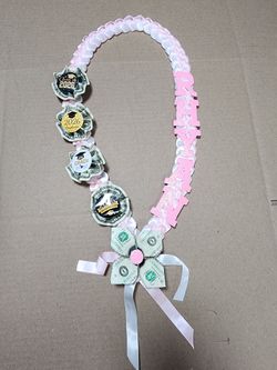 Pink grad lei