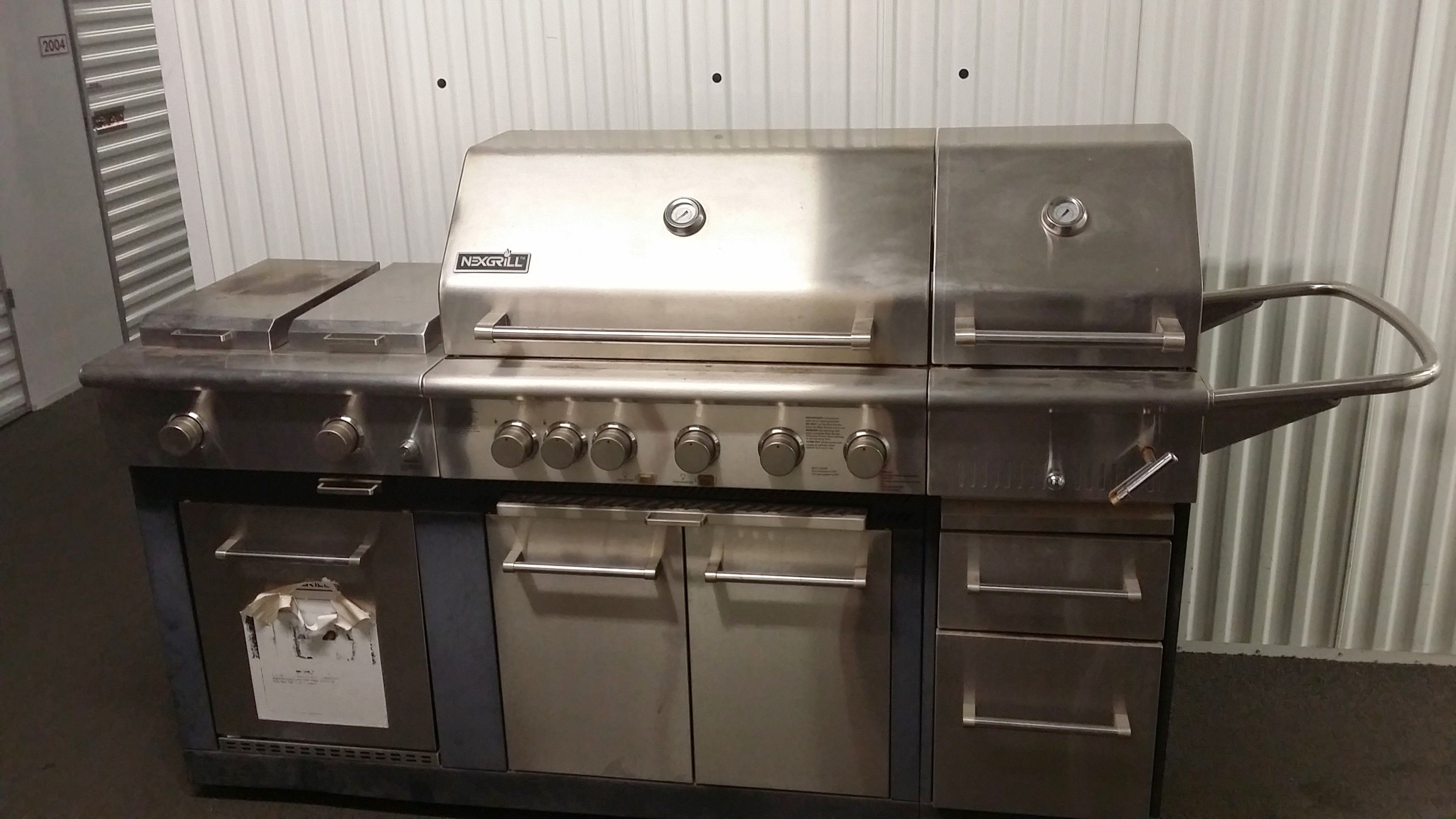 Nexgrill 6 burner, 2 side burner, rotisserie, & mini-fridge