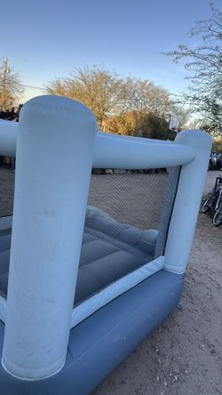 Bounce house with a blower motor