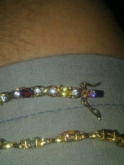 18 k over sterling silver real stones.