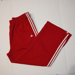 The VTG Adidas Tearaway Sz XL Track Pants in Men's 3 Stripe Snap Button embroidery are a stylish and comfortable option for activewear. Made with nylo