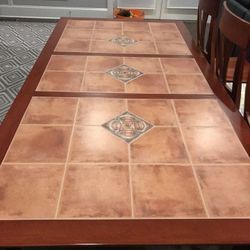 72x35 inches dinning table with 6 chairs. Removable leaf turns table ready for 4 chairs