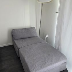 Gray modular ottoman and sofa set