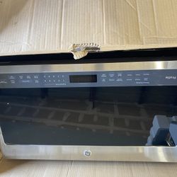 Brand new open box GE Profile™ Series 2.1 Cu. Ft. Over-the-Range Sensor Microwave Oven Stainless Steel retails at $650 Can Deliver Dimensions:17 5/16