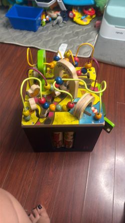 wooden activity cube