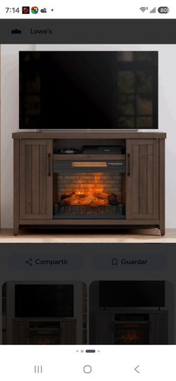 cabinet with a fire effect resembling real coal