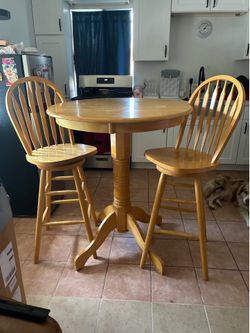 Height Table and 2 Swivel Stools