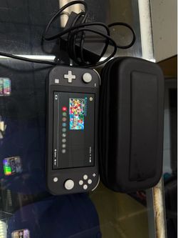 Nintendo Switch Lite Black w/ 128 GB SD card + 2 games