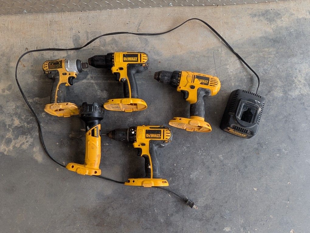 Lot Of DeWalt Drills And Flashlight. No Batteries Included But Charger Is