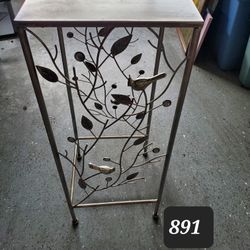 Iron Pedestal Table With Nature Accents