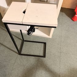 C-shaped end table or side table, built-in charging ports,