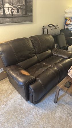 Leather reclining loveseat