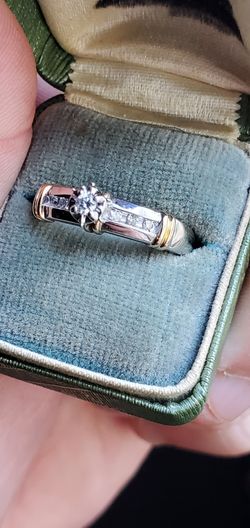 14k gold ring with quarter carat of diamonds