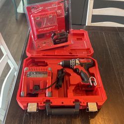 Milwaukee Drill, Battery And 2 Chargers 