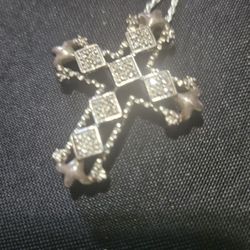 Silver with diamonds cross
