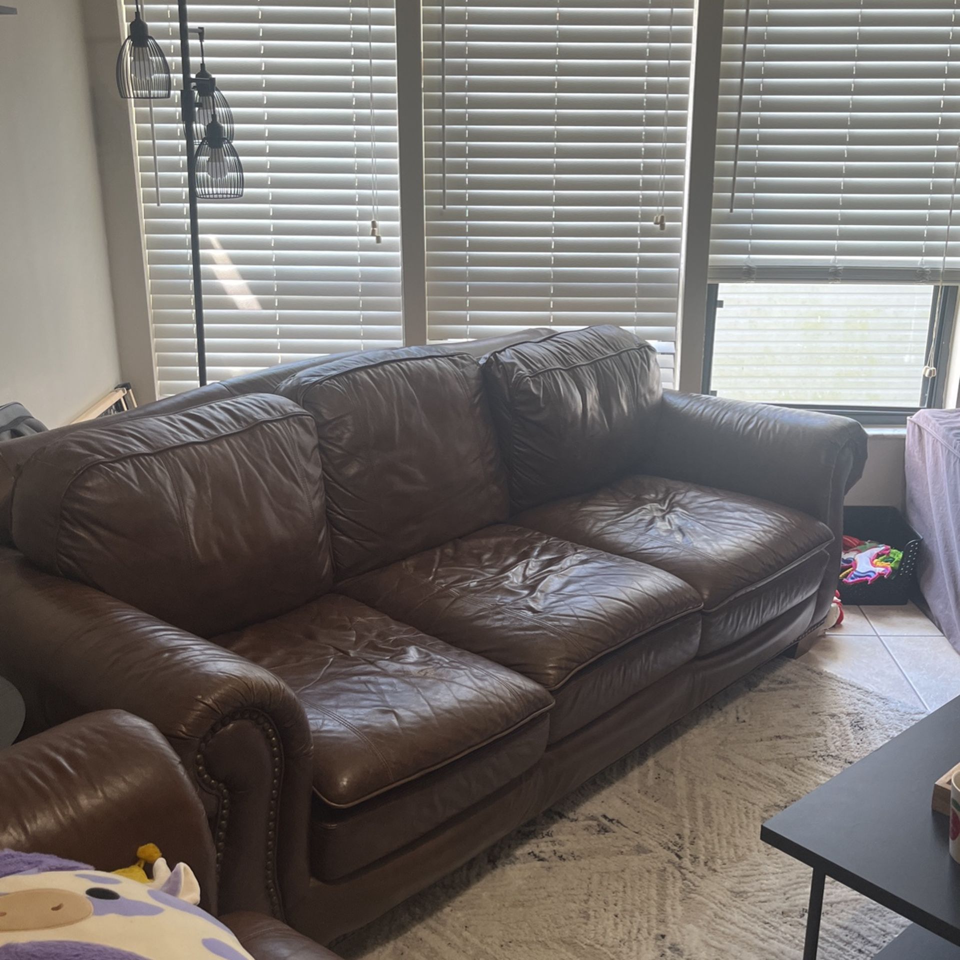 **FREE: 3-Seater Leather Couch + Loveseat**