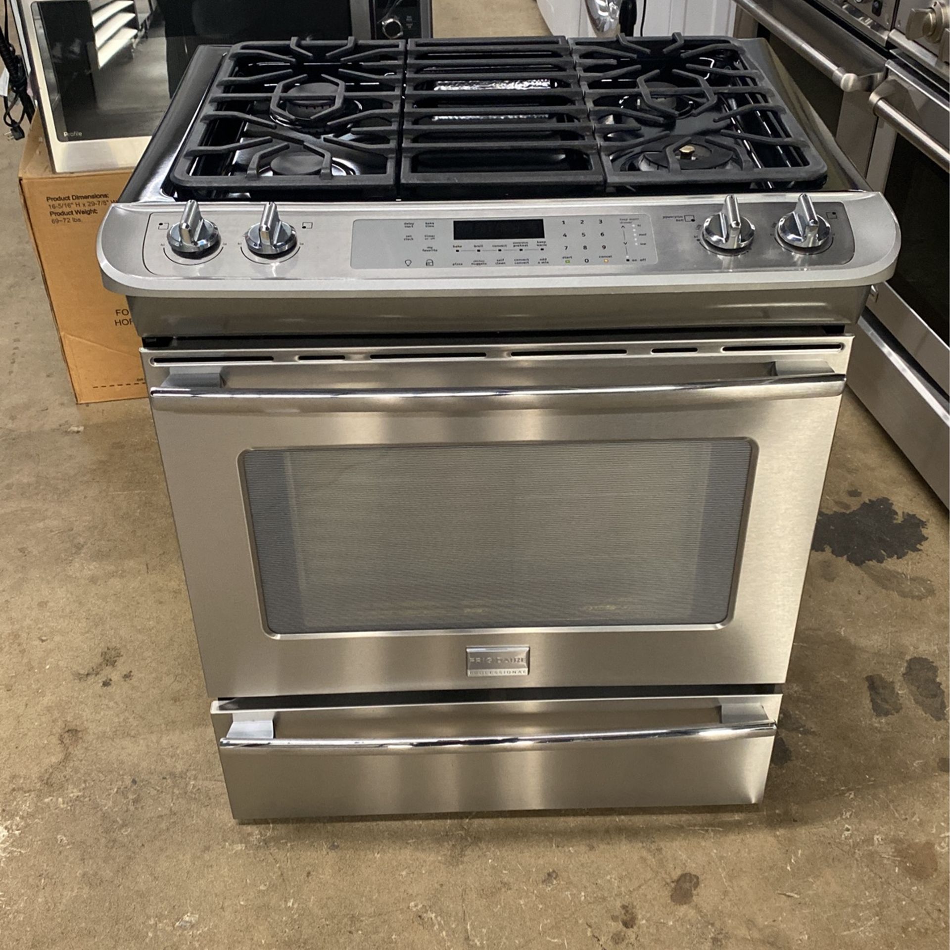 Frigidaire Professional Slide -in Gas Stove. Stainless Steel 31.5 W 23 D 36.5 H