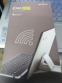 Wireless keyboard and tablet stand