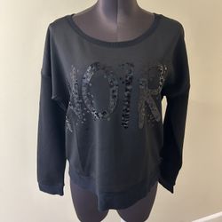 Rock & Republic Black Sequin Noir Women's Top size L Stylish black sweatshirt with bold sequin design. Comfortable and trendy. Excellent condition 