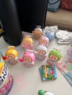 25 MINISO YOYO figures from cupid ring, fly with the wind and tilted head collection