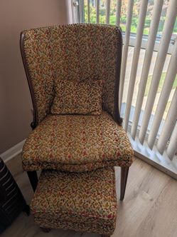 Vintage chair with ottoman.