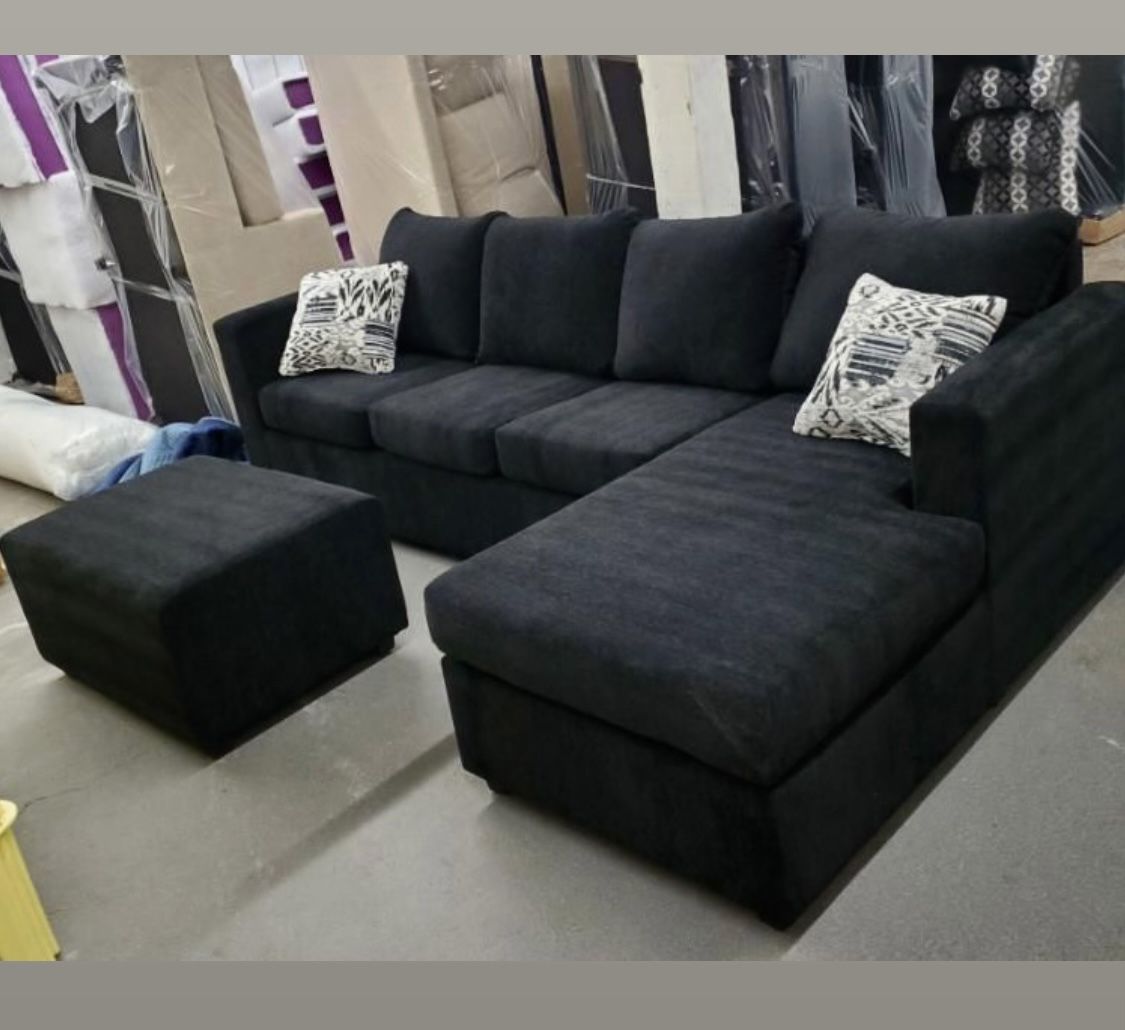 Black Sectional With Ottoman