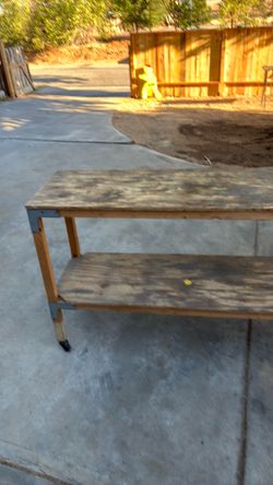 WOOD TANLE 4 Foot s longer by 16 inches wide and 32 high