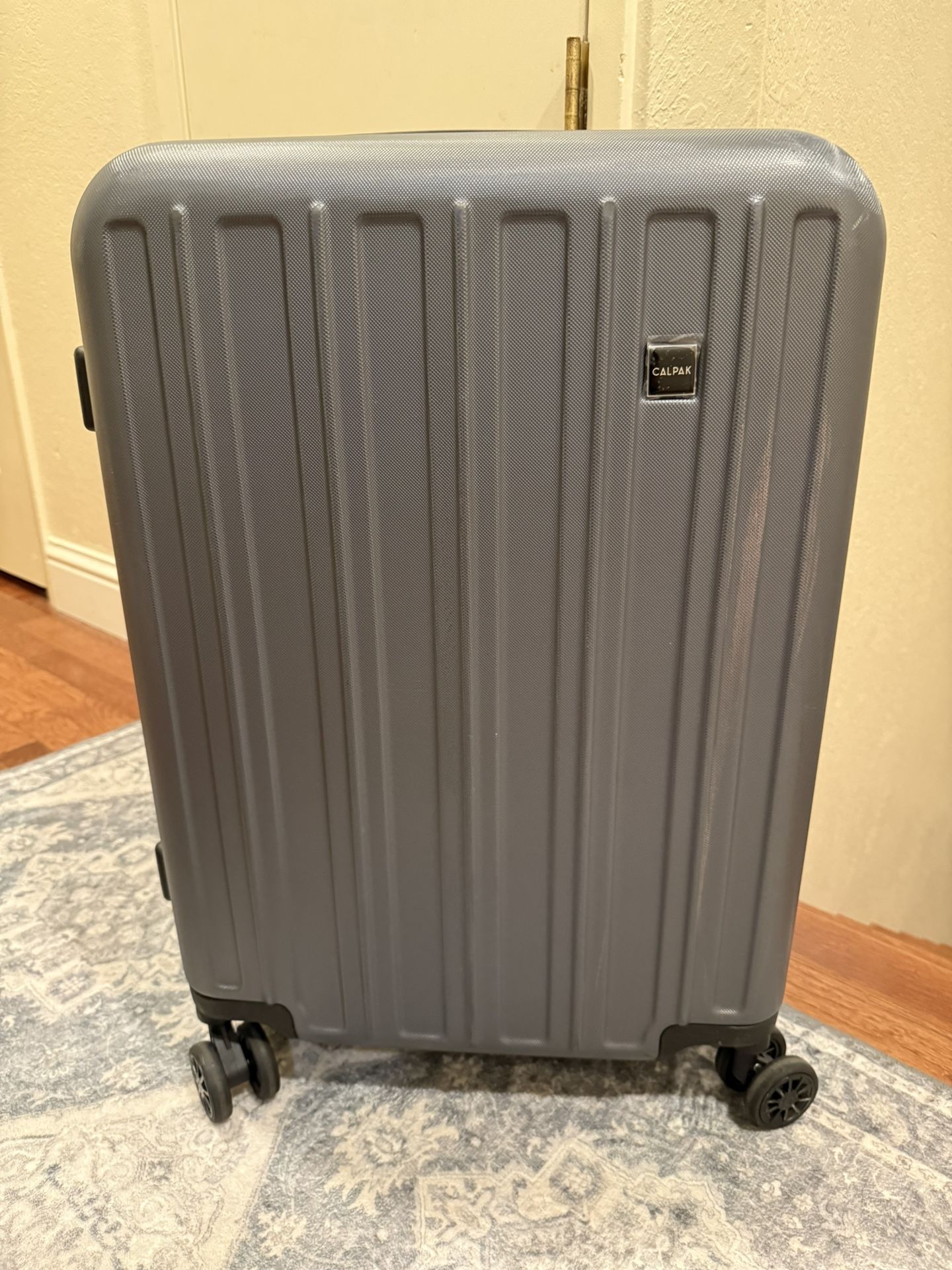 Suitcase 24” X 16” .