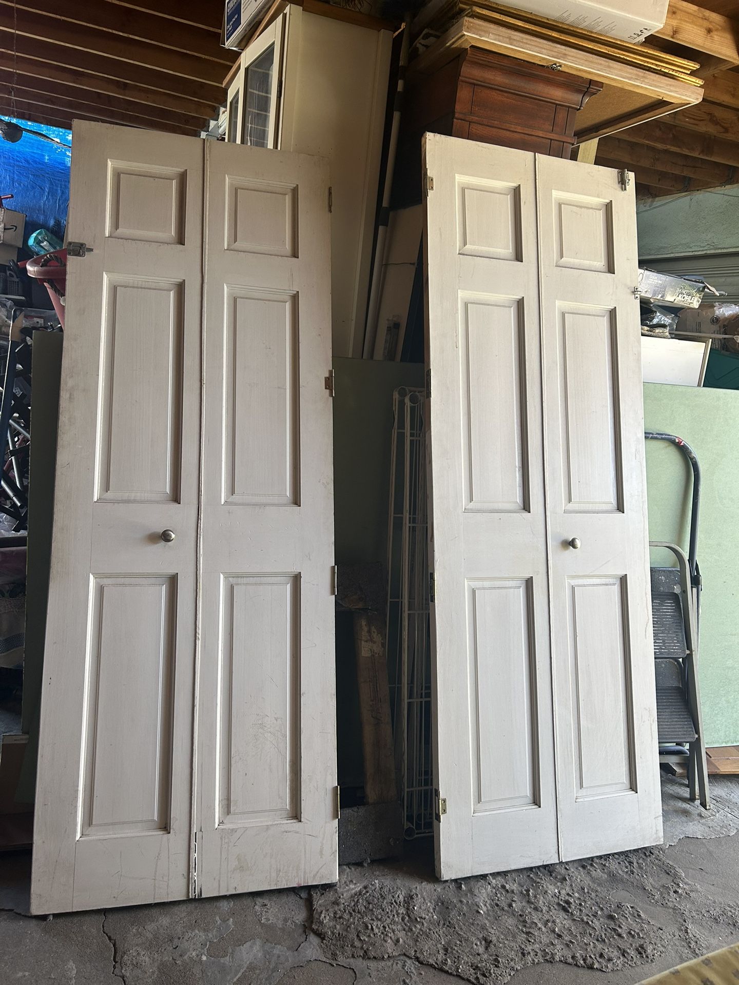 Solid wood doors can be used in closets or inside the house. They are very heavy. Price for one $35. Measurements of each door are 27x77.