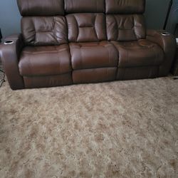 BROWN LEATHER RECLINING SOFA