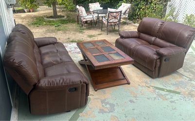 Brown Leather Reclining Sofa and Loveseat Set with coffee table