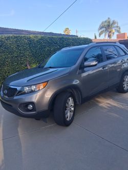 Kia Sorento EX V6 con 3 lineas de siillas