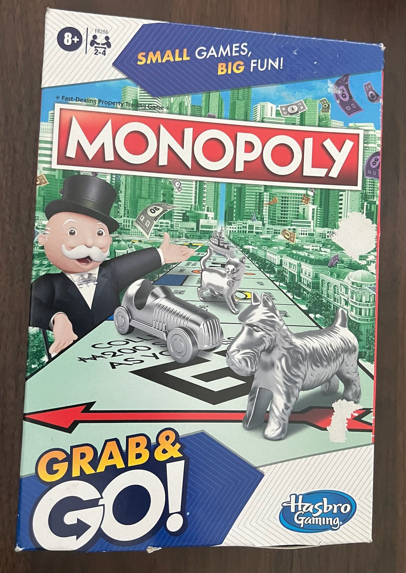 Monopoly Grab & Go Game Travel Size game for ages 8+ from Hasbro