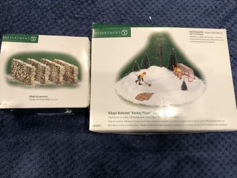 Department 56 animated hockey player and stonewalls