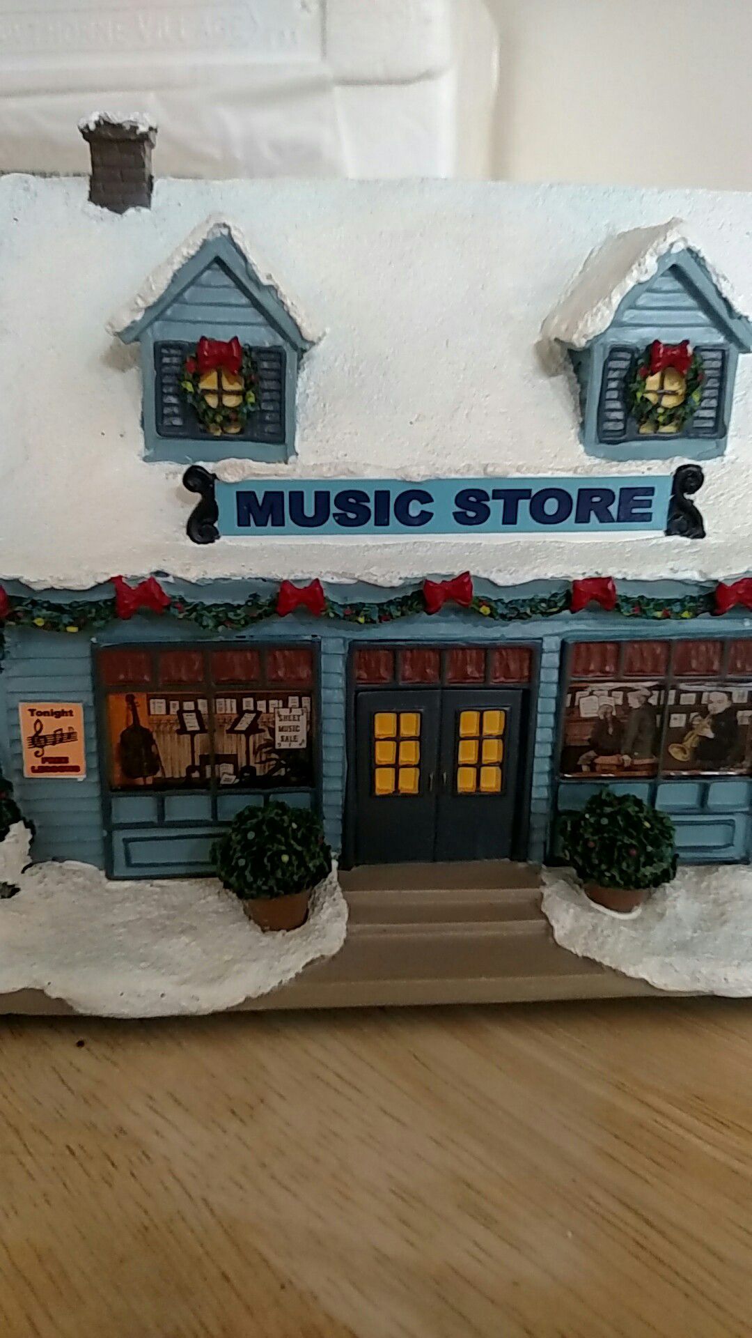 Norman Rockwell's Christmas village Music store