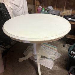SOLID TABLE AND TWO CHAIRS