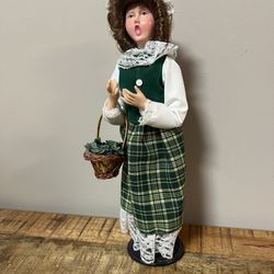 Carolers Series Collective Doll dressed in primitive green outfit