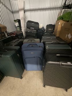 New 36in suitcases