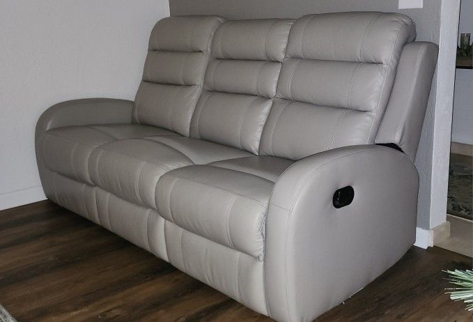 Kanes Beautiful Couch And Easy To Wipe -sides Are Recliners