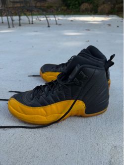 Jordan’s 12 Retro University gold Size: 5.5Y