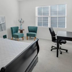 Two Forest Green Scalloped Accent Chairs