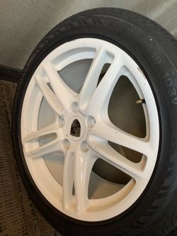 Porsche OEM white alloy wheels with Continental ContiProContact tires