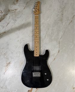 Black guitar for beginners.